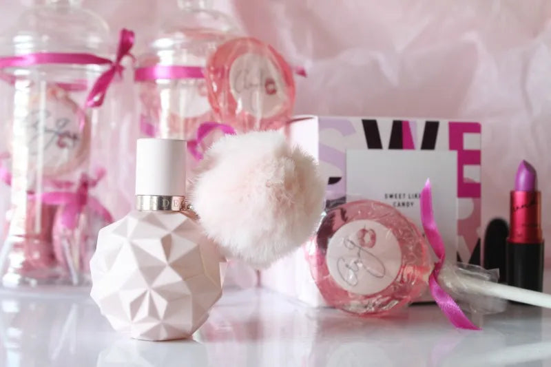 Ariana Grande Sweet Like Candy EDP — playful gourmand with red berries and whipped cream.