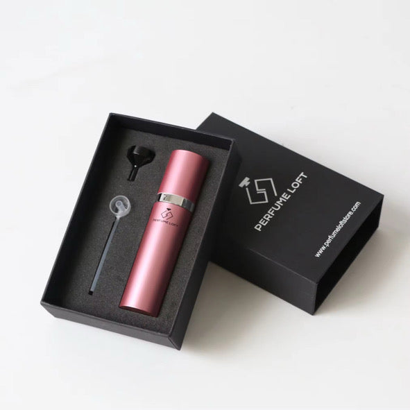 Sophisticated fragrance bottle with delicate detailing and a timeless, luxurious design.