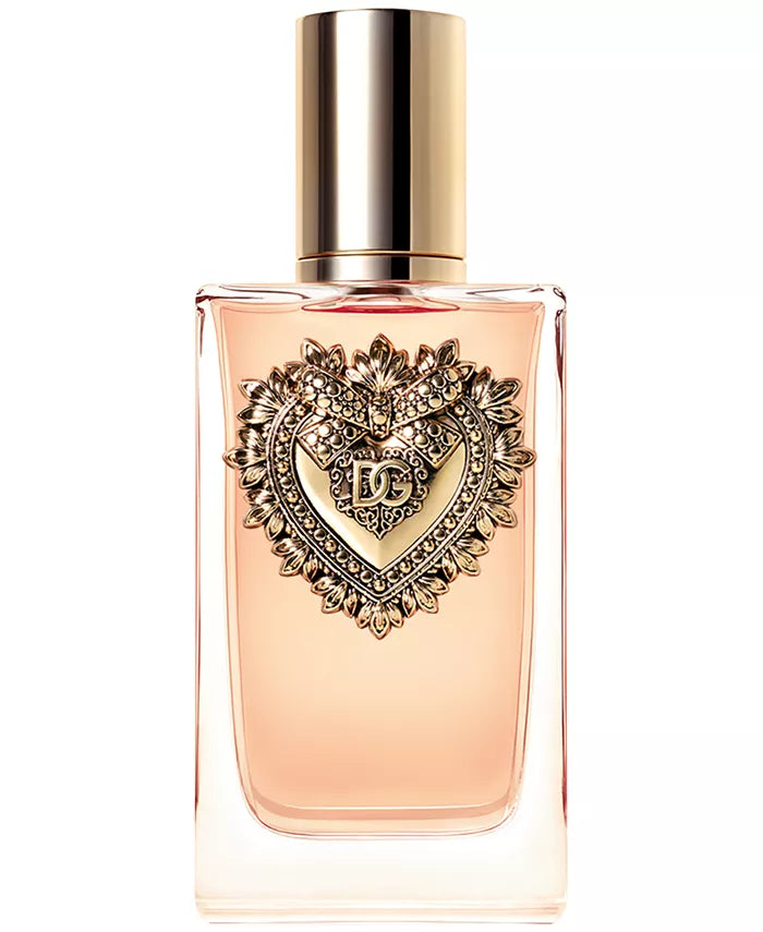 Devotion perfume with classic curved bottle and romantic floral fragrance.