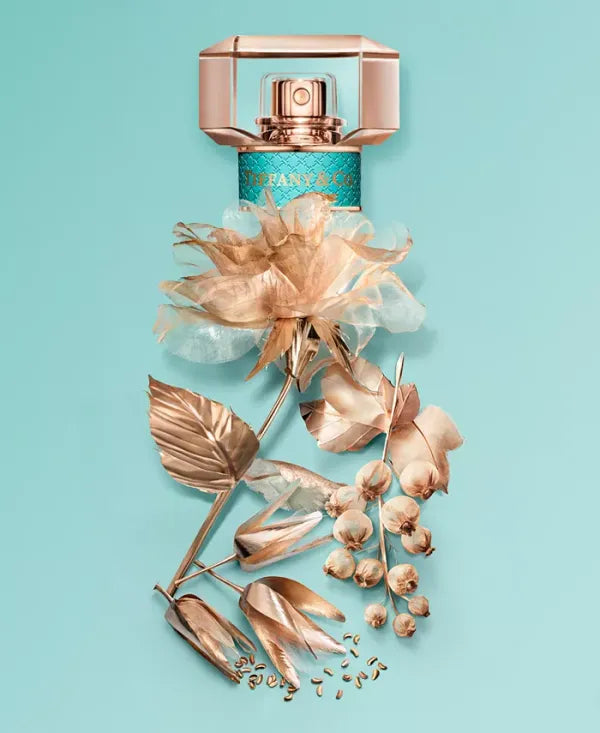 Rose gold toned perfume bottle with sleek design
