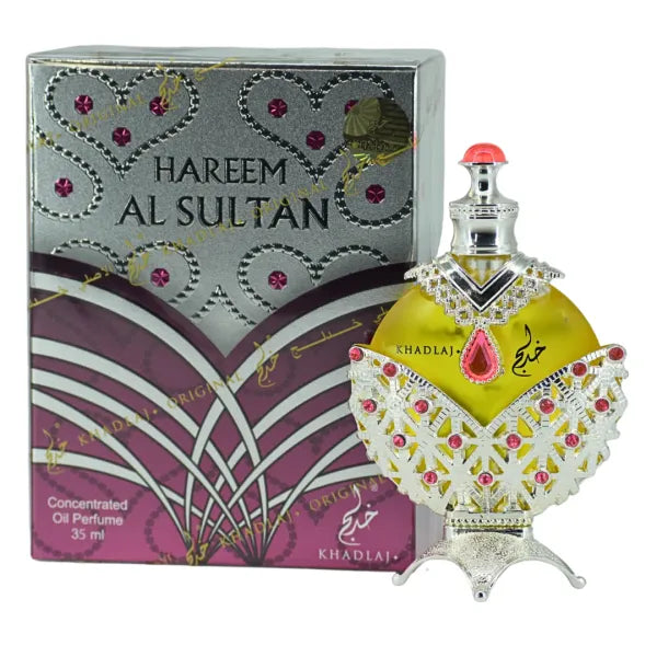 Silver perfume oil in a sleek metallic bottle with dropper-style cap for concentrated application.