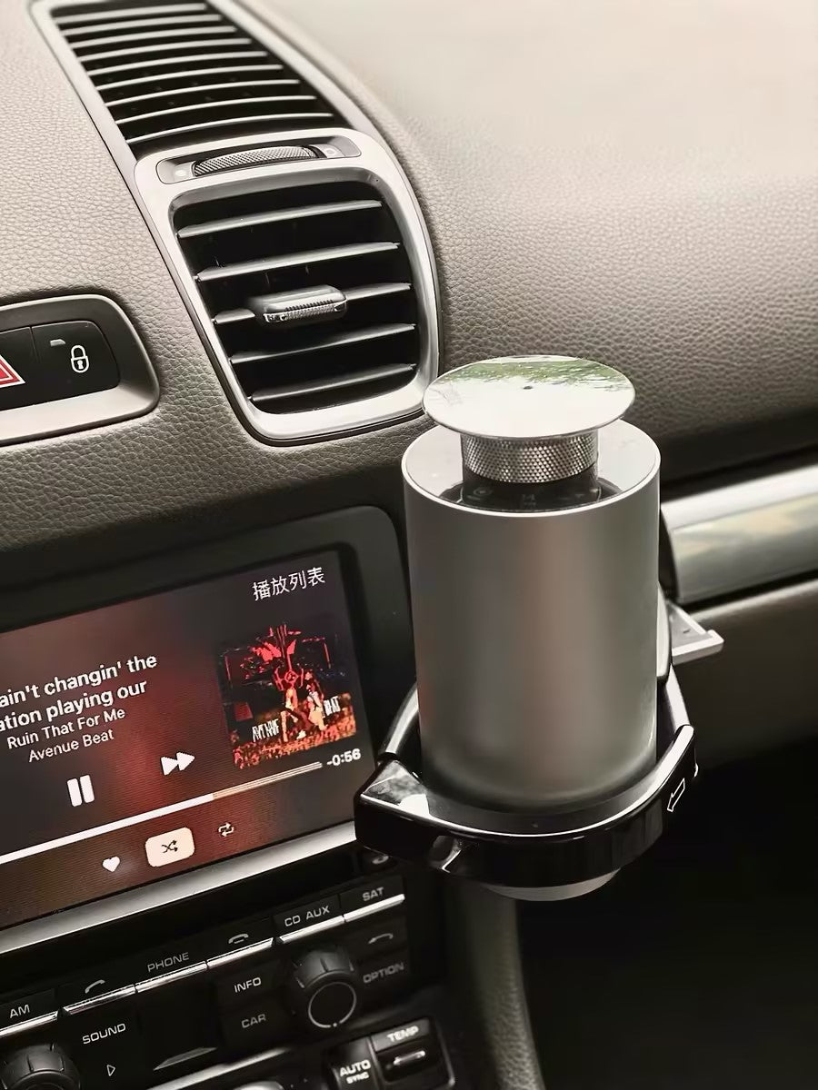 Porsche car air freshener diffuser, fits cup holder for fresh, stylish scent.
