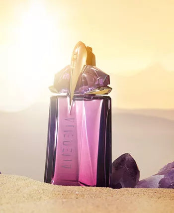 Mugler Alien — mysterious jasmine-amber fragrance in amethyst bottle.
