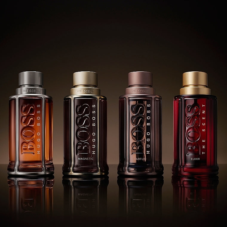 Hugo Boss perfumes with deep blue glass and metallic accents, evoking a modern scent.
