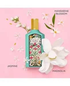 Gucci Flora Gorgeous Jasmine Eau de Parfum in a turquoise bottle with floral pattern.

