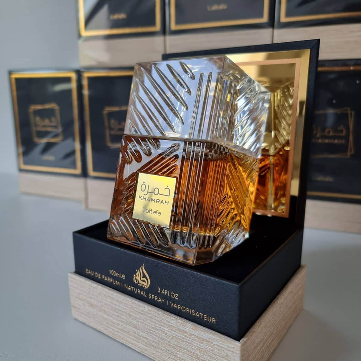 Lattafa Khamrah Eau de Parfum 100ml with golden cap and rich, spicy scent.

