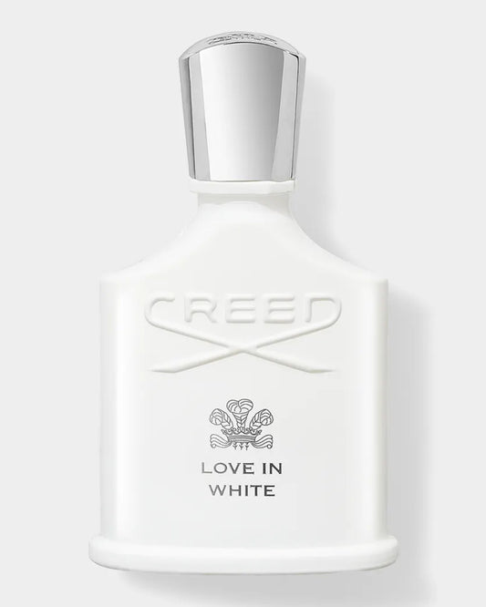 Creed Love in White perfume bottle on a light gray background