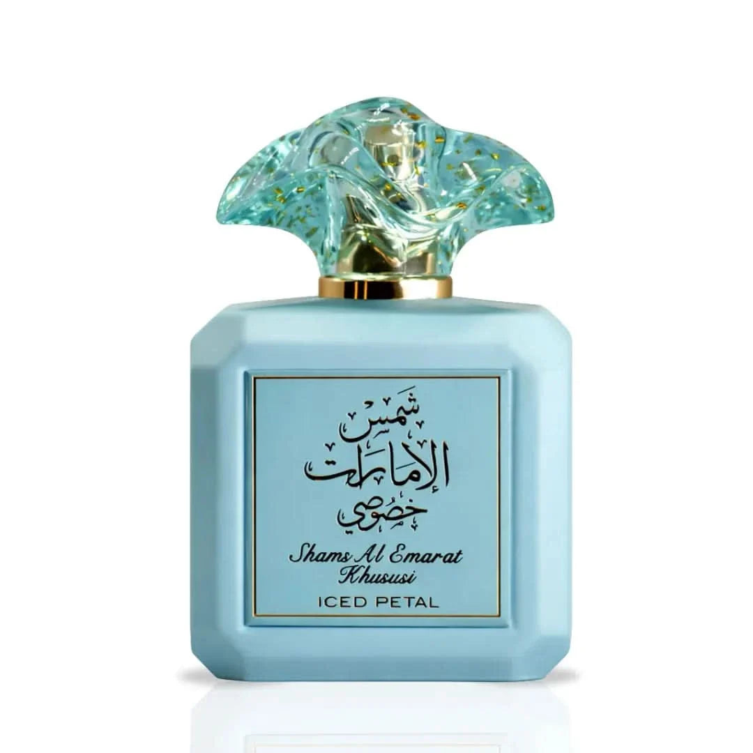 Perfume bottle with decorative cap on a white background